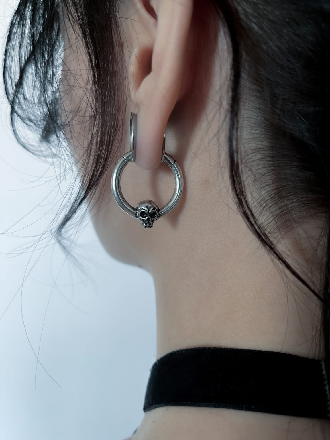 skull-shaped gothic ear tunnel charm for stretched ear lobes