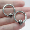 skull-shaped ear tunnel charm for stretched ear lobes