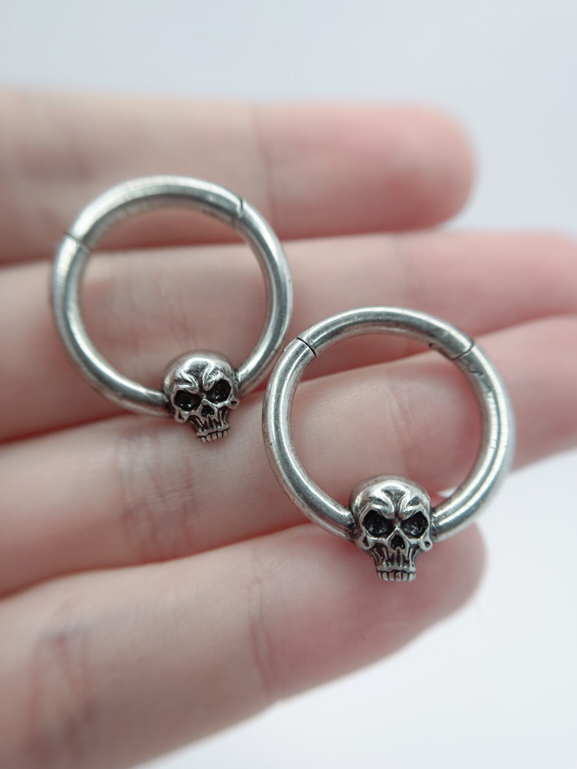 skull-shaped ear tunnel charm for stretched ear lobes