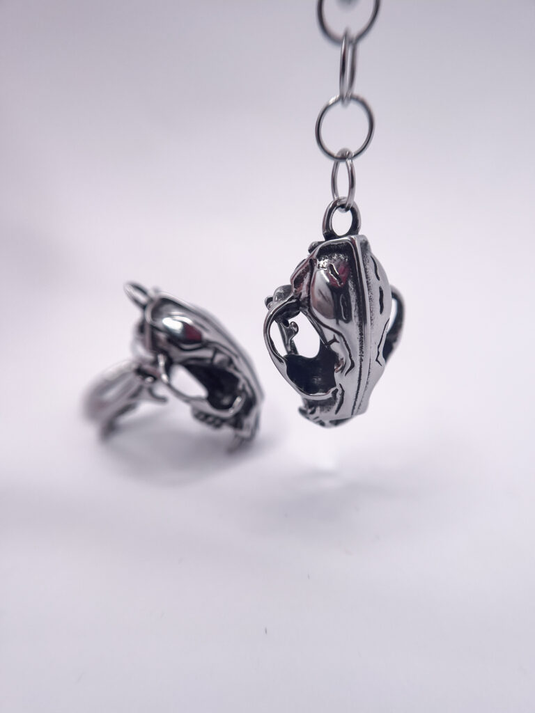 a pair of silver ear tunnel charms - tiger skull